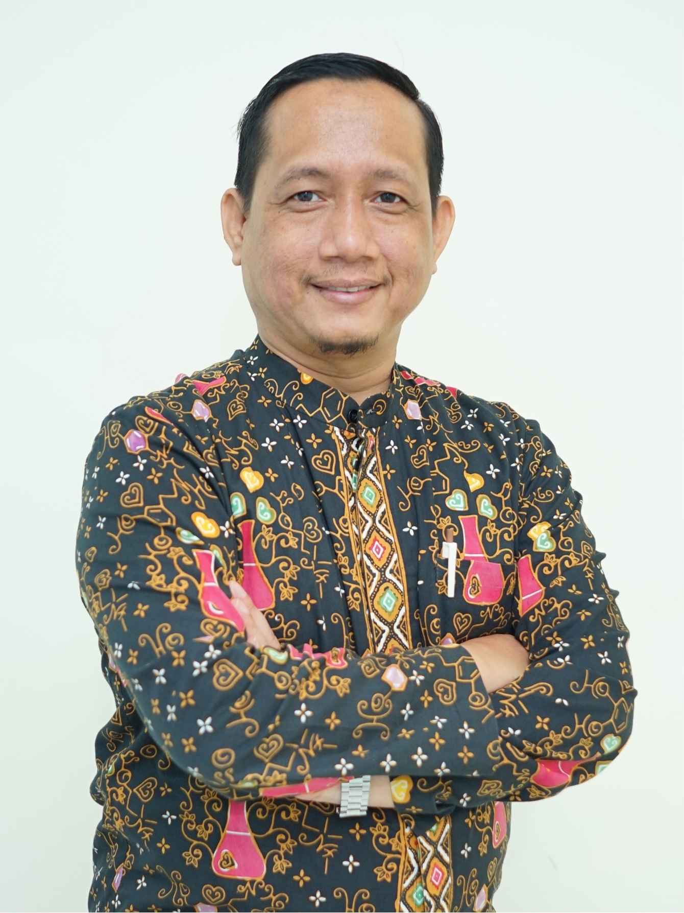 Rusman, M.Si.